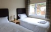 tulip lodge white cross bay twins