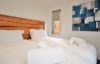 Old Spot log cabin, Westward Ho, North Devon twin bedroom